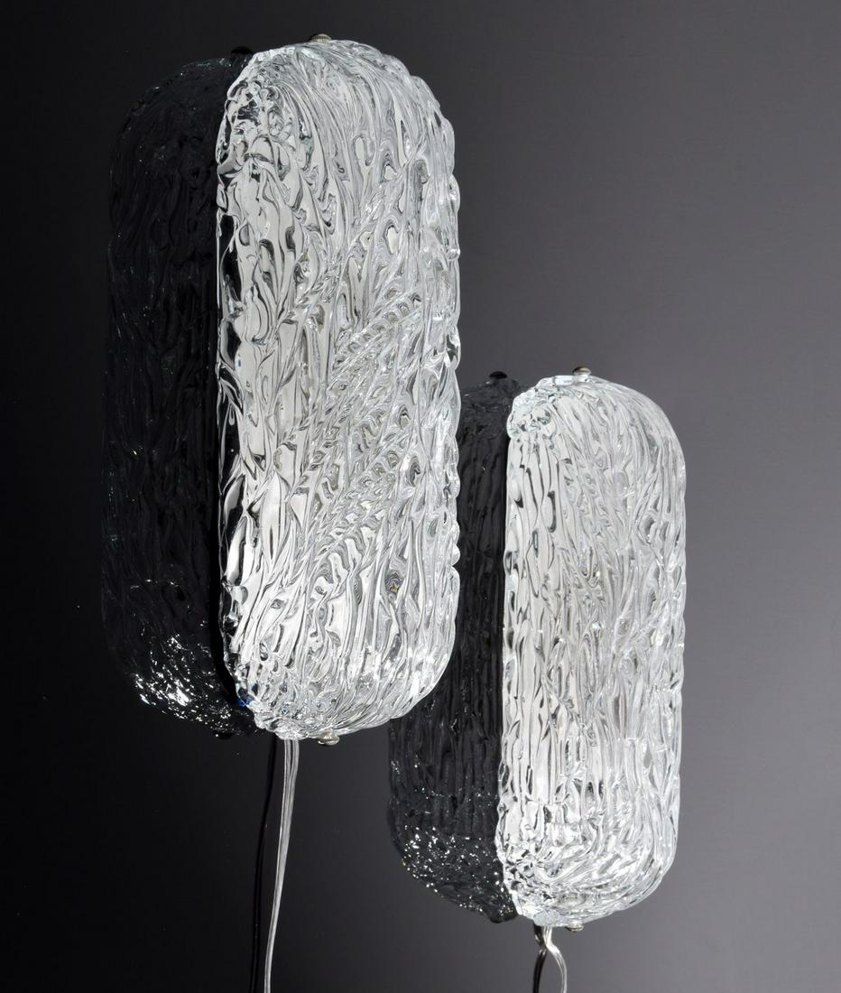 Pair of Murano Sconces, Manner of Barovier & Toso: Artist/Designer; Manufacturer: Barovier & Toso, manner of Marking(s); notes: no marking(s) apparent Country of origin; materials: Italy; glass, metal Dimensions (H, W, D): 14"h, 5"w, 4"d Additional In