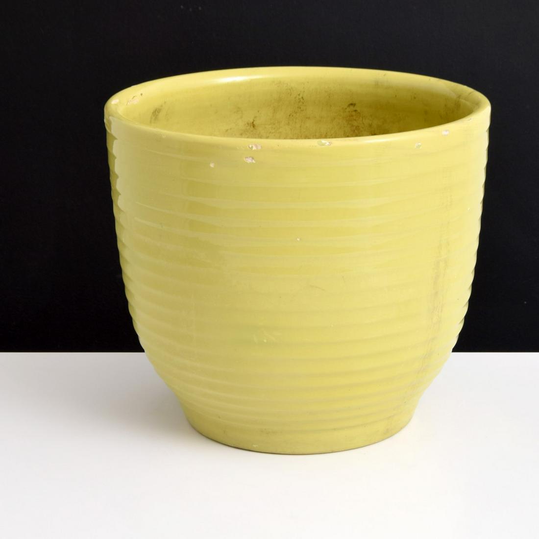 Large Bauer Yellow Ringware Jardiniere/Planter: Artist/Designer; Manufacturer: J.A. Bauer Pottery Co. Marking(s); notes: no marking(s) apparent Country of origin; materials: USA; ceramic Dimensions (H, W, D): 13"h, 15"dia Additional Information: Ce