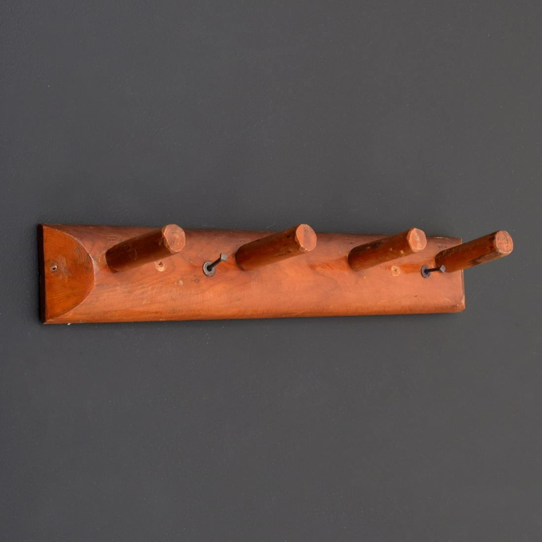 Rittenhouse Furniture Coat Rack, Adirondack Style: Artist/Designer; Manufacturer: Rittenhouse Furniture Marking(s); notes: no marking(s) apparent Country of origin; materials: USA; wood Dimensions (H, W, D): 5"h, 30"w, 7"d Additional Information: "A