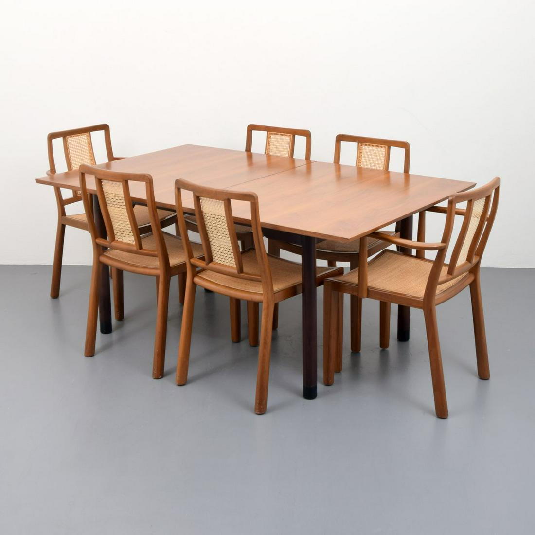 Edward Wormley Dining Table & 6 Chairs: Artist/Designer; Manufacturer: Edward Wormley; Dunbar Marking(s); notes: Dunbar plaque, original order label Country of origin; materials: USA; wood, caning Dimensions (H, W, D): table: 29.25"h, 67"w,