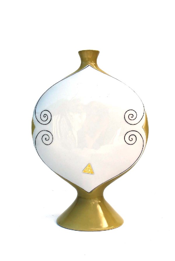 Royal Dux Vase: Designer & Manufacturer: Royal Dux Country of Origin & Materials: Bohemia; Porcelain Additional Information & Circa: Vase by Royal Dux, signed; Circa 1930's Dimensions: 9.25"H, 6.25"W, 2.25"D