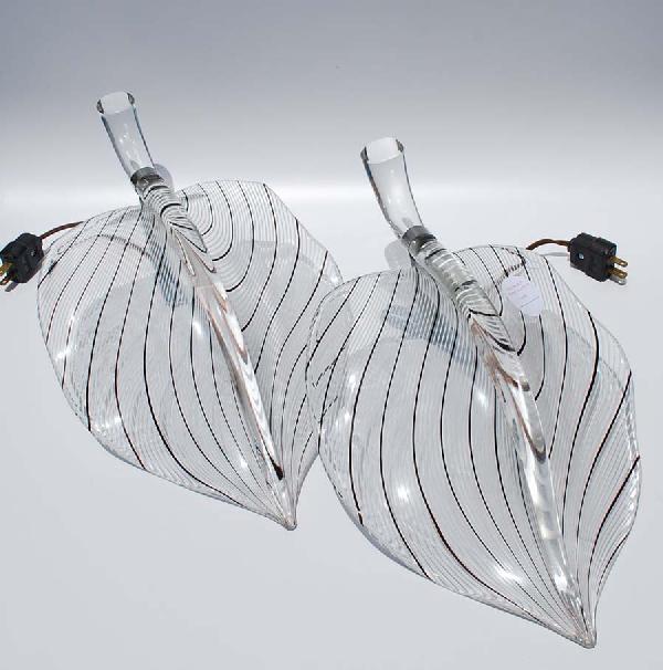 Pair of Sconces Attributed to Seguso: Designer & Manufacturer: Archimede Seguso Attributed Country of Origin & Materials: Italy; Blown Glass, Metal Additional Information & Circa: Pair of sconces attributed to Seguso in clear with black &