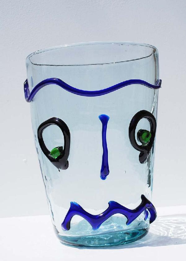 Face Vase by Blenko: Designer & Manufacturer: Blenko Country of Origin & Materials: USA; Blown Glass Additional Information & Circa: Face vase by Blenko, unsigned Dimensions: 9.25"H, 6.5"Dia.