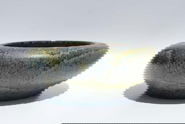 Large Raymor Frogskin Bowl: Designer & Manufacturer: Raymor Country of Origin & Materials: Pottery Additional Information & Circa: Large matte frogskin glazed bowl, Raymor label; Circa 1960's Dimensions: 4"H, 10.5"Dia.