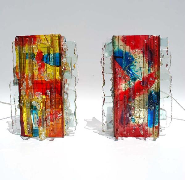 Pair of Raak Sconces: Designer & Manufacturer: A. Lankhorst Attributed; Raak Country of Origin & Materials: Netherlands; Glass, Metal Additional Information & Circa: Pair of multi-colored glass sconces attributed to A. Lan