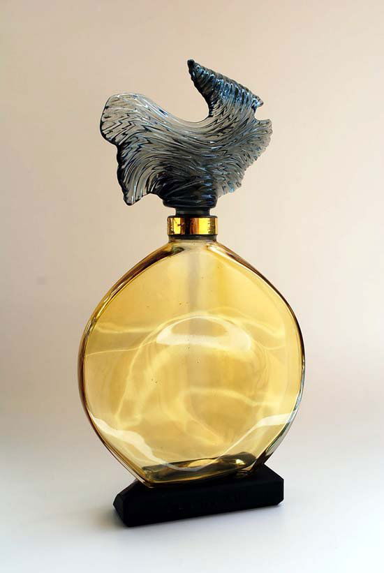 Large Guerlain Factice Perfume Bottle: Designer & Manufacturer: Country of Origin & Materials: Blown Glass Additional Information & Circa: Large factice perfume bottle, Guerlain Dimensions: 16.5"H, 8.5"W, 3"D