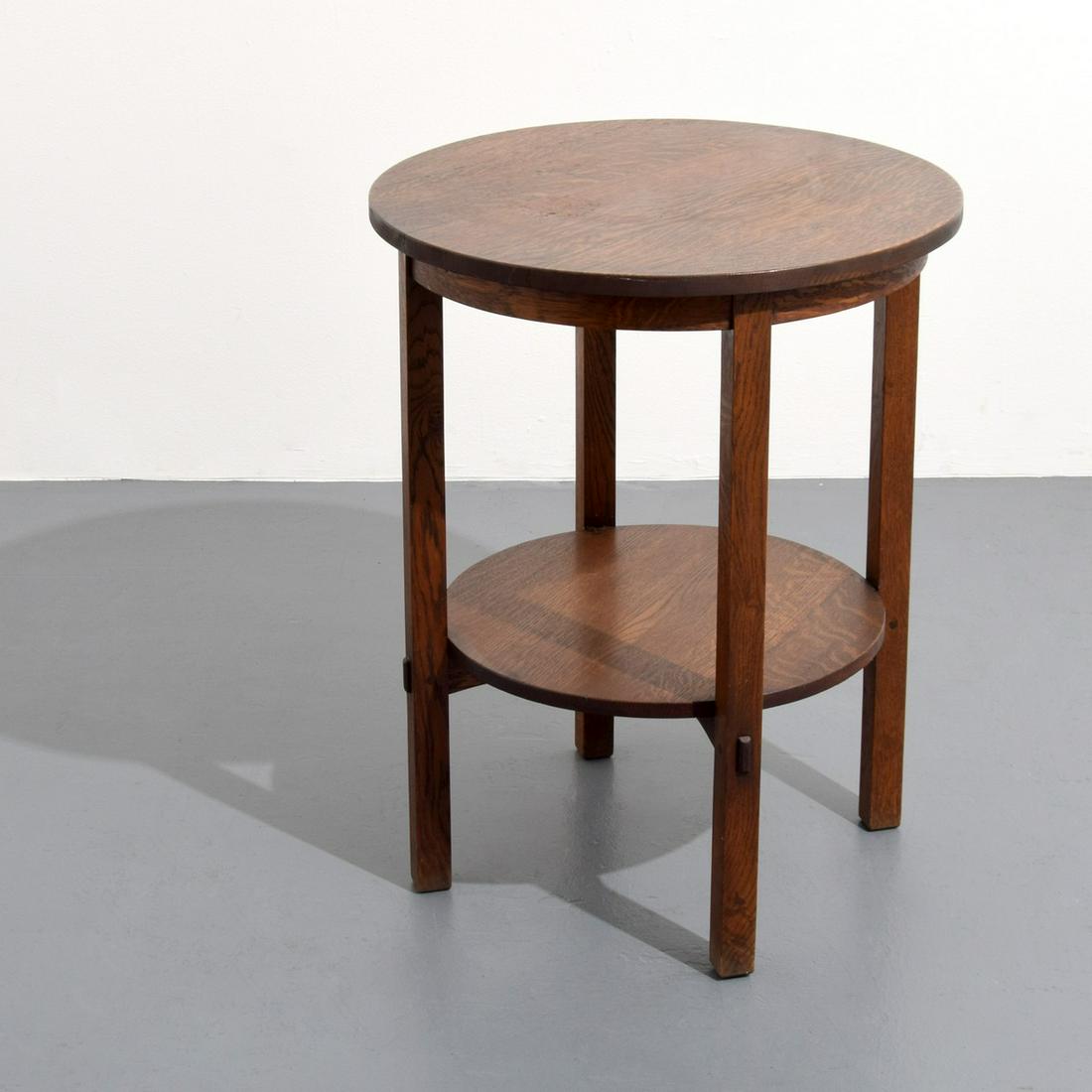 L & JG Stickley Mission Oak Lamp Table: Artist/Designer; Manufacturer: L & JG Stickley Marking(s); notes: no marking(s) apparent Country of origin; materials: USA; oak Dimensions (H, W, D): 30.25"h, 24"dia Additional Information: Two-tier t