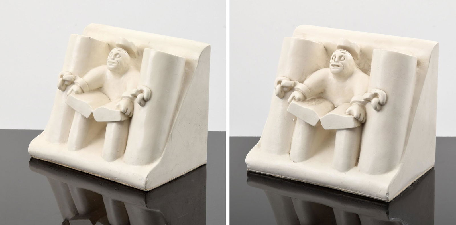 Pair of Tom Otterness "Educated King" Bookends: Artist/Designer; Manufacturer: Tom Otterness (b. 1952) Marking(s); notes: signed; from the edition of 50; 1984 Country of origin; materials: American; cast plaster Dimensions (H, W, D): 8"h, 9.5"w, 6.