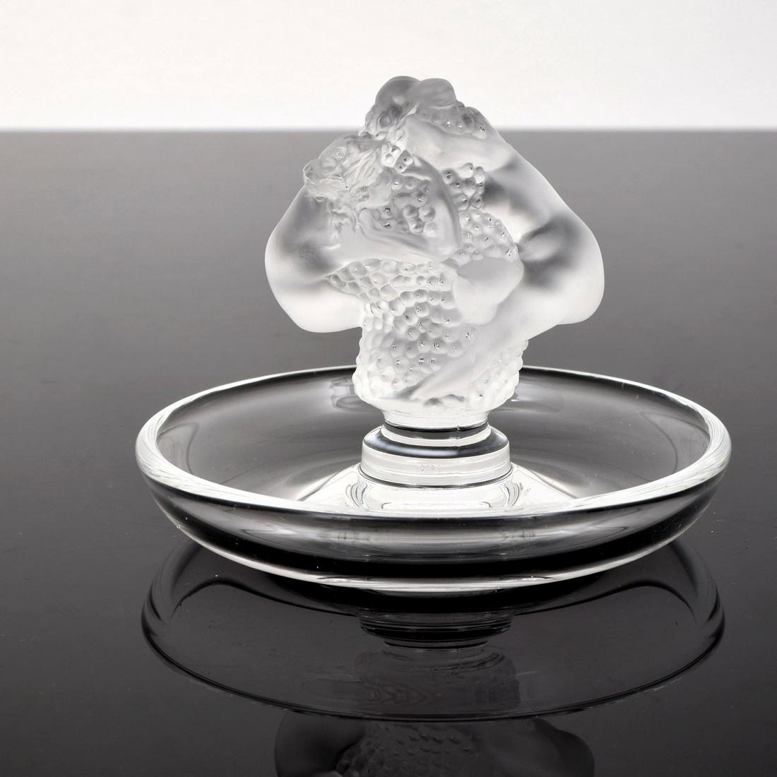 Lalique "Roxane" Ring Holder: Artist/Designer; Manufacturer: Lalique Marking(s); notes: signed, marking(s) Country of origin; materials: France; glass Dimensions (H, W, D): 3.25"h, 3.75"dia Additional Information: Reference: Laliq
