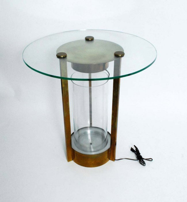 Dorothy Thorpe Table: Designer & Manufacturer: Dorothy Thorpe Markings: none Country of Origin & Materials: USA; brass or bronze, glass, aluminum Additional Information & Circa: Quality end / side table with center cylinde