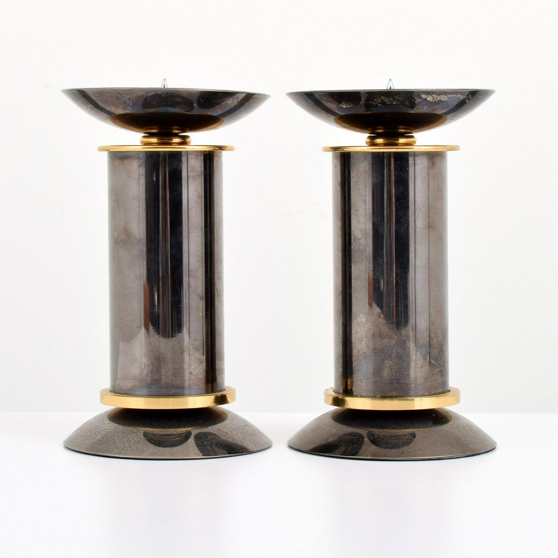 Pair of Karl Springer Gunmetal Candlesticks: Artist/Designer; Manufacturer: Karl Springer; Karl Springer Ltd Marking(s); notes: no marking(s) apparent Country of origin; materials: USA; mixed metals Dimensions (H, W, D): 7.5"h, 4.5"dia Additiona