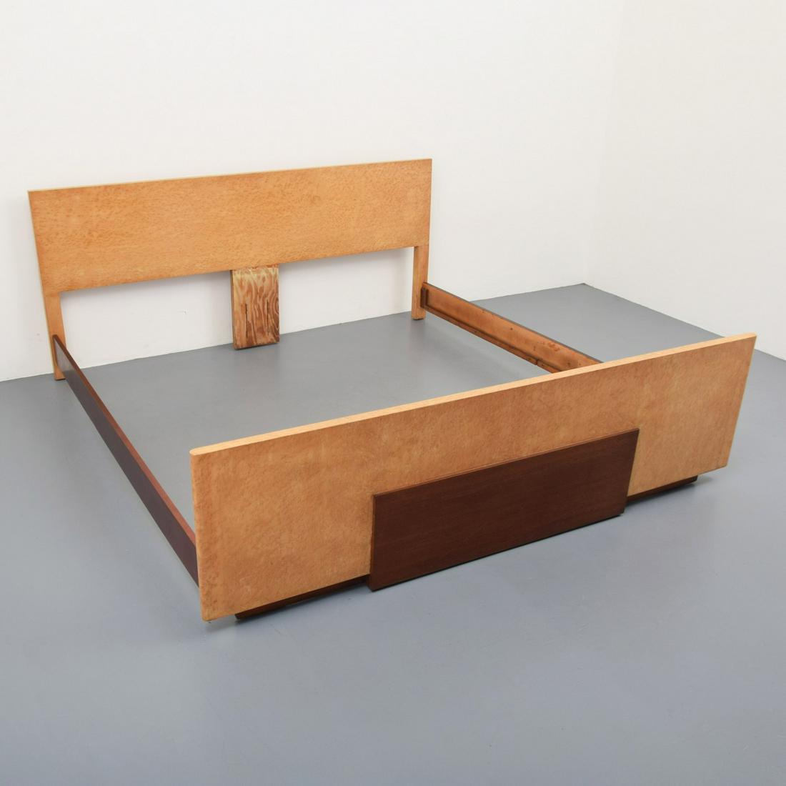 Rare Gilbert Rohde King Size Bed: Artist/Designer; Manufacturer: Gilbert Rohde; Herman Miller Marking(s); notes: marking(s) Country of origin; materials: USA; bird's eye maple, walnut Dimensions (H, W, D): 32"h, 75"w, 76"d; footboard: