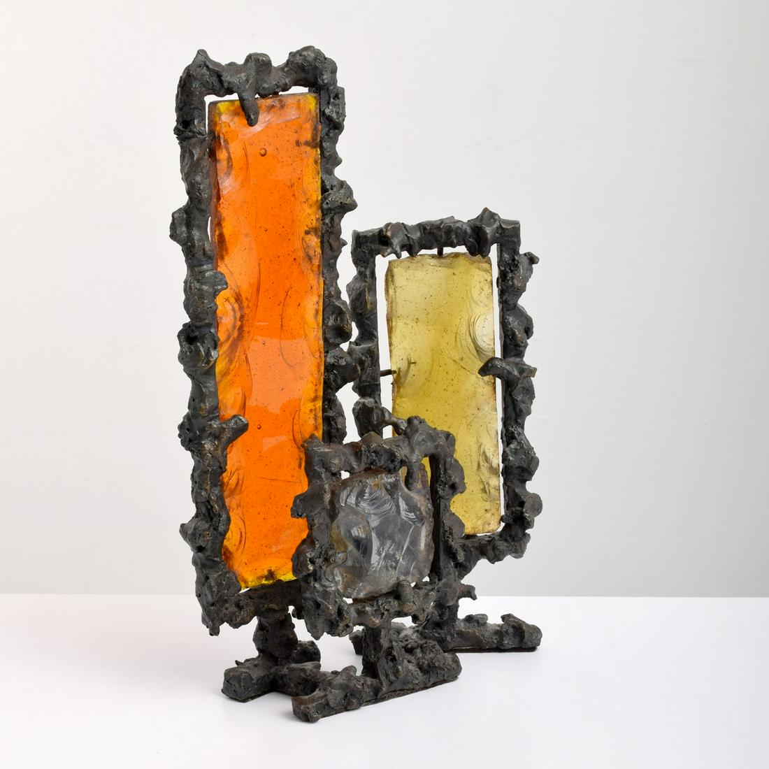 Marcello Fantoni Brutalist Sculpture: Artist/Designer; Manufacturer: Marcello Fantoni; Raymor Marking(s); notes: signed, marking(s), 404 Country of origin; materials: Italy; bronzed metal, glass Dimensions (H, W, D): 15.5"h, 9"w, 3.5"d Ad