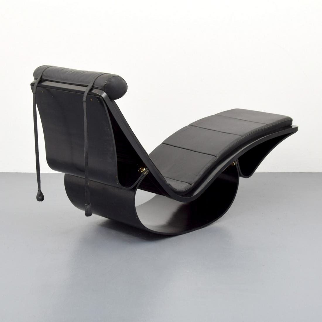 Oscar Niemeyer "Rio" Chaise Lounge Chair: Artist/Designer; Manufacturer: Oscar Niemeyer; Fasem Marking(s); notes: no marking(s) apparent Country of origin; materials: Brazil; enameled wood, leather, metal Dimensions (H, W, D): 34.75"h, 60"w,