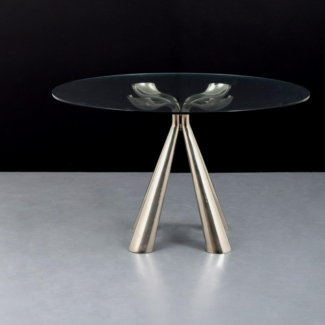 Vittorio Introini Dining Table: Artist/Designer; Manufacturer: Vittorio Introini; Saporiti Marking(s); notes: no marking(s) apparent Country of origin; materials: Italy; cast aluminum, glass Dimensions (H, W, D): 27.5"h, 24"dia (tab