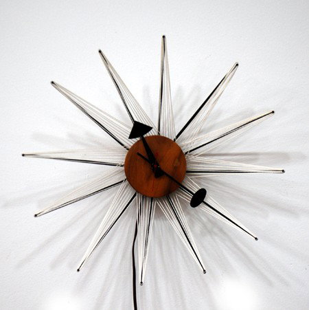 George Nelson String Clock: Designer & Manufacturer: George Nelson; Howard Miller Clock Co. Markings: none Country of Origin & Materials: USA; enameled steel, walnut, string Additional Information & Circa: George Nelson & Associ