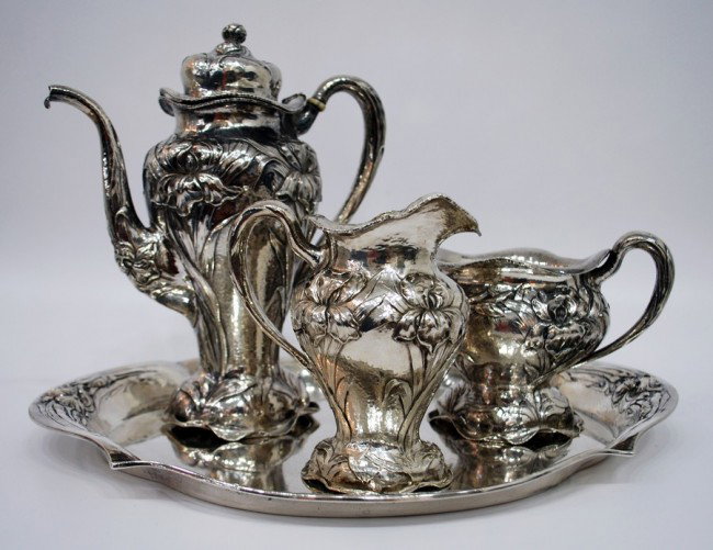 Art Nouveau Sterling Silver Tea Set by Marcus and : Designer & Manufacturer: Marcus and Company Markings: signed Country of Origin & Materials: USA; sterling silver Additional Information & Circa: Sterling silver tea set by Marcus and Company; Circa 19