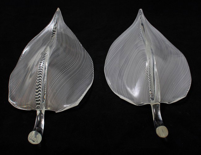 Pair of Murano Sconces Attributed to Archimede Seg: Designer & Manufacturer: Archimede Seguso, attributed Markings: none Country of Origin & Materials: Italy; glass, metal Additional Information & Circa: Pair of blown glass sconces attributed to Archim