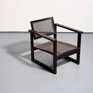 Peter Keler Bauhaus Lounge Chair: Artist/Designer; Manufacturer: Peter Keler (1898-1982); Albert Walde Marking(s); notes: no marking(s) apparent Country of origin; materials: German; wood, caning Dimensions (H, W, D): 27"h, 27.5"w, 27