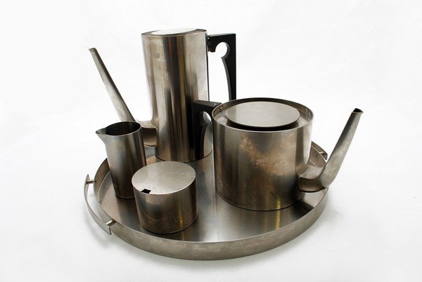 Arne Jacobsen "Cylinda" Service: Designer & Manufacturer: Arne Jacobsen; Stelton Markings: marked Country of Origin & Materials: Denmark; stainless steel, chrome, plastic Additional Information & Circa: 5 piece stainless "Cylinda" te
