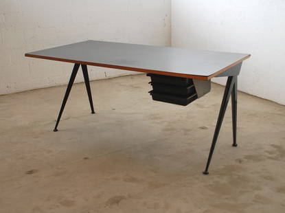 Rare Jean Prouve Compass Desk: Designer & Manufacturer: Jean Prouve, Ateliers Jean Prouve Markings: none Country of Origin & Materials: France; enameled steel, laminate, plastic Additional Information & Circa: Fine & rare "Compass"