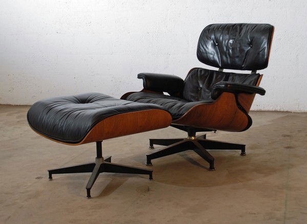 Eames Rosewood Lounge Chair & Ottoman: Designer & Manufacturer: Charles & Ray Eames; Herman Miller Markings: label Country of Origin & Materials: USA; rosewood, leather, steel Additional Information & Circa: Leather and rosewood lounge cha