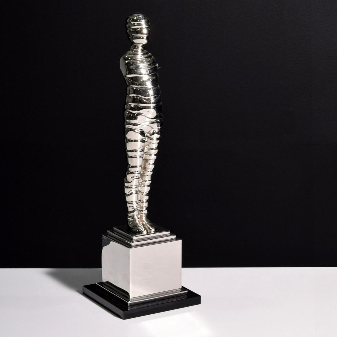 Ernest Trova "Standing Wrapman" Sculpture: Artist/Designer; Manufacturer: Ernest Trova (1927-2009) Marking(s); notes: studio imprint; ed. 6/8; 1986 Country of origin; materials: American; stainless steel, acrylic (base) Dimensions (H, W, D)