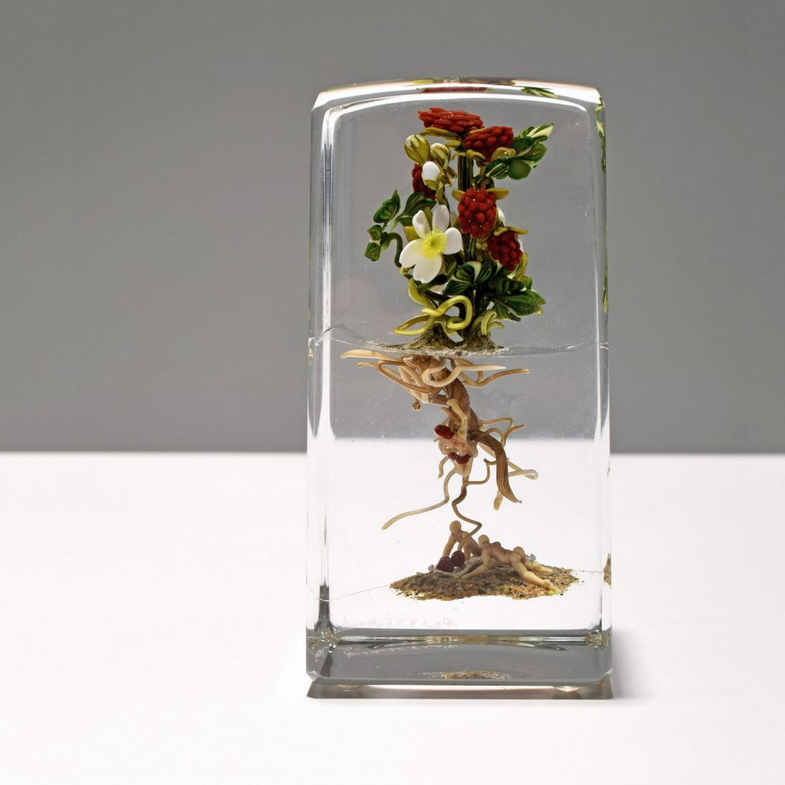 Paul J. Stankard Botanical / Root People Upright Paperweight: Artist/Designer; Manufacturer: Paul J. Stankard (b. 1943) Marking(s); notes: signed Country of origin; materials: American; lampwork glass, polished clear glass Dimensions (H, W, D): 4.5"h, 2.625"w, 2