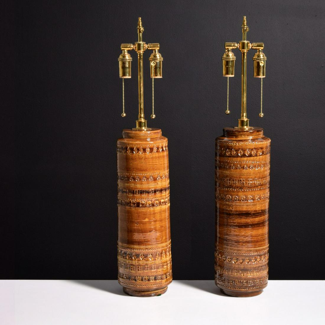 Pair of Bitossi Lamps, Attributed to Aldo Londi: Artist/Designer; Manufacturer: Aldo Londi, attributed; Bitossi Marking(s); notes: 3015 Base, 2065 Base, marking(s) Country of origin; materials: Italy; ceramic, brass Dimensions (H, W, D): 30"h, 6