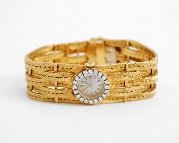 Patek Philippe 18K Women's Watch: Designer & Manufacturer: Patek Philippe Markings: marked Country of Origin & Materials: Switzerland; 18K gold, diamonds Additional Information & Circa: 18K gold & round brilliant cut diamond women's w