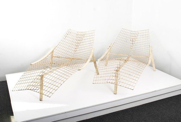 Pair of French Chaise Lounges: Markings: none Country of Origin & Materials: France; metal Additional Information & Circa: Pair of modernist chaise lounge chairs. Sculptural forms; c. 1950 (Key Word Search: Woodard, outdoor furnitu