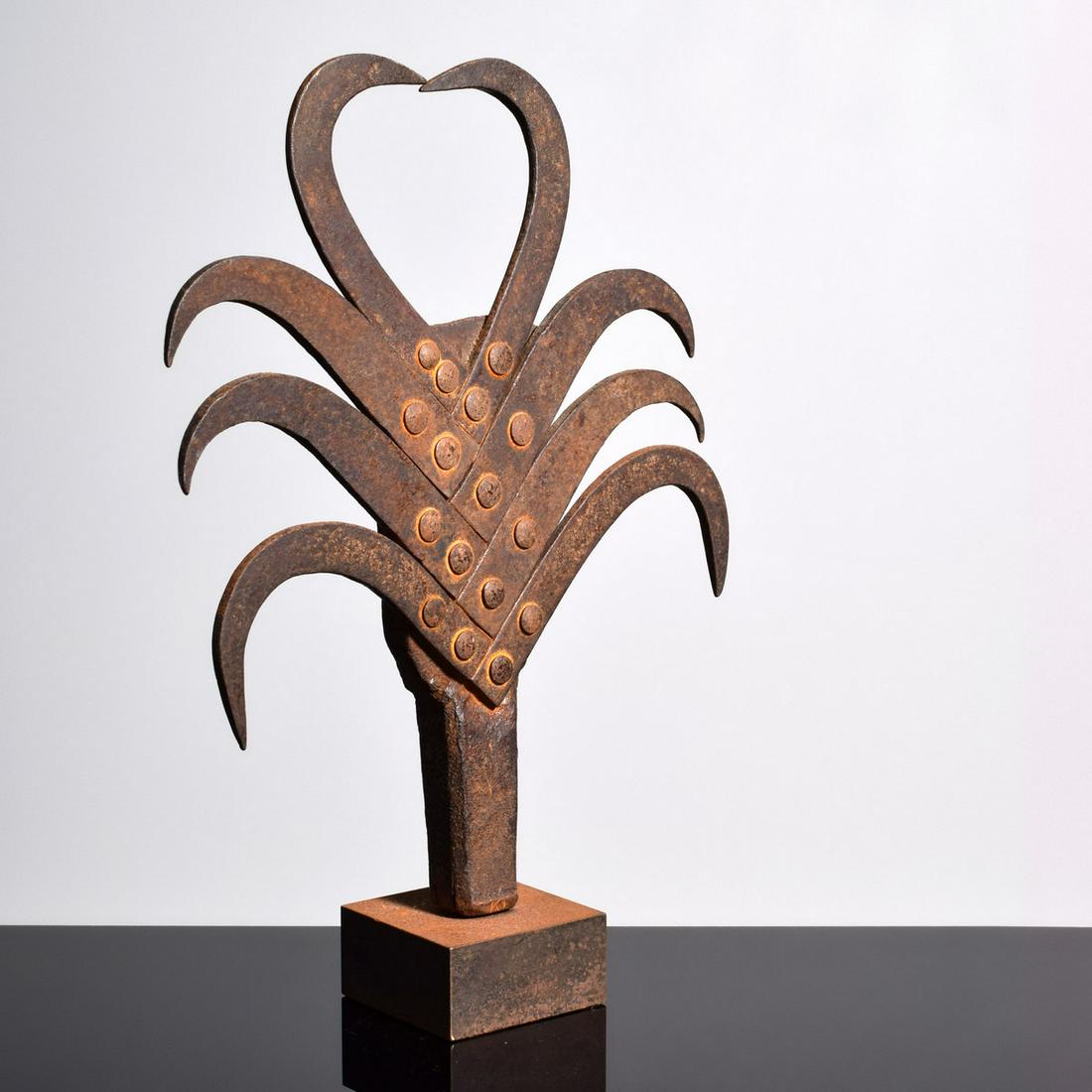 Klaus Ihlenfeld Sculpture: Artist/Designer; Manufacturer: Klaus Ihlenfeld (b. 1934) Marking(s); notes: signed Country of origin; materials: German/American; reclaimed patinated iron Dimensions (H, W, D): 12.75"h, 9.25"w, 2.5"d 