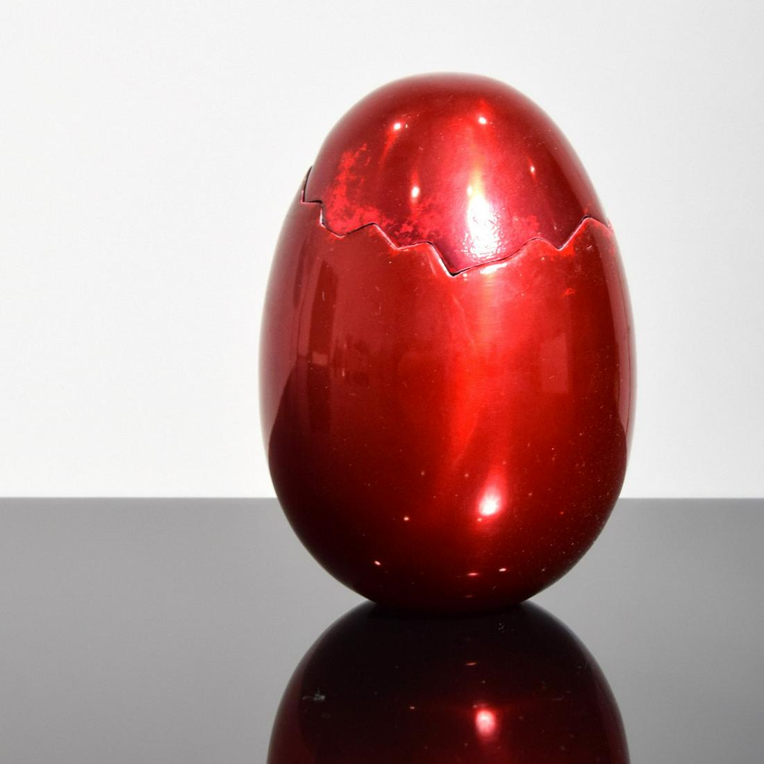 Jeff Koons CRACKED EGG Sculpture / Box: Artist/Designer; Manufacturer: Jeff Koons (b. 1955) Marking(s); notes: no marking(s) apparent; edition of 1000; 2008 Country of origin; materials: American; glazed aluminum Dimensions (H, W, D): 4.75"