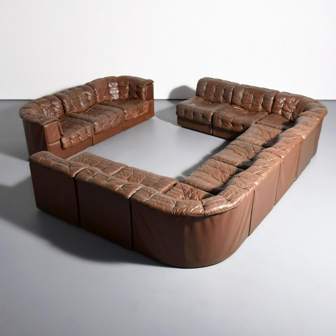De Sede Sectional Sofa, 12 Pcs.: Artist/Designer; Manufacturer: de Sede Marking(s); notes: de Sede Turner Ltd. label Country of origin; materials: Switzerland; leather Dimensions (H, W, D): corner pieces: 25"h, 44.5"w, 37.5"d; armles