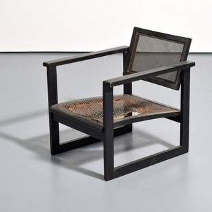 Peter Keler Bauhaus Lounge Chair: Artist/Designer; Manufacturer: Peter Keler (1898-1982); Albert Walde Marking(s); notes: no marking(s) apparent Country of origin; materials: German; wood, caning Dimensions (H, W, D): 27"h, 27.5"w, 27