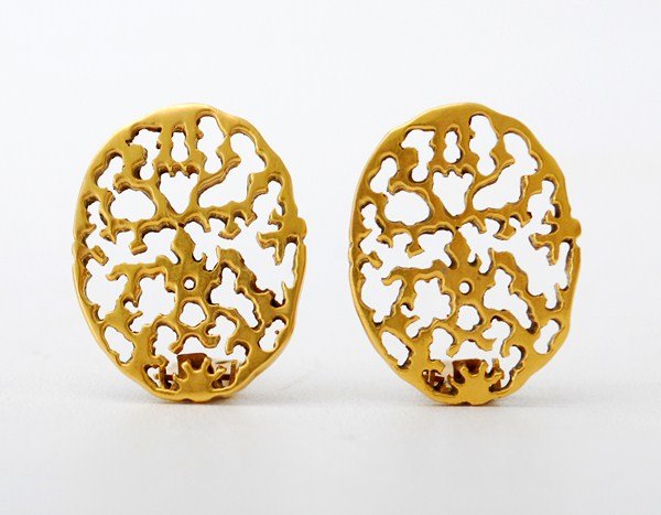 Vintage Ear Clips by Mary McFadden: Designer & Manufacturer: Mary McFadden Markings: none Country of Origin & Materials: USA; metal Additional Information & Circa: Vintage handcrafted ear clips by fashion designer Mary McFadden. McFadde