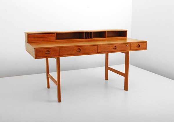 Jens Quistgaard Desk: Designer & Manufacturer: Jens Quistgaard; Lovig Dansk Markings: marked Country of Origin & Materials: Denmark; teak Additional Information & Circa: Functional desk with hinged gallery to top which fol