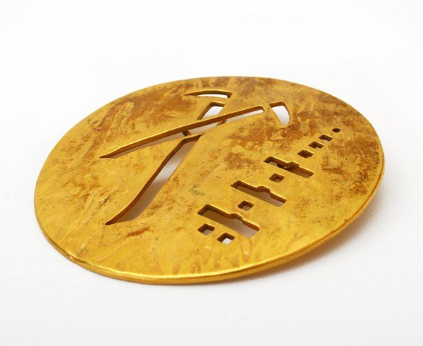 Vintage Pendant by Mary McFadden: Designer & Manufacturer: Mary McFadden Markings: marked Country of Origin & Materials: USA; metal Additional Information & Circa: Vintage handcrafted pendant which can be worn as a belt or necklace by