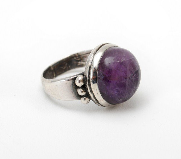 Sterling & Amethyst Ring by William Spratling: Designer & Manufacturer: William Spratling Markings: marked Country of Origin & Materials: Mexico; sterling silver, amethyst Additional Information & Circa: Sterling silver and amethyst ring by Willia