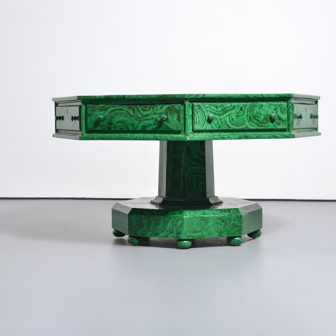 Large Faux Malachite Octagonal Rent / Center Hall Table: Artist/Designer; Manufacturer: unknown Marking(s); notes: no marking(s) apparent Materials: white oak, faux malachite Dimensions (H, W, D): 31"h, 53.5"dia Additional Information: The table has eight d