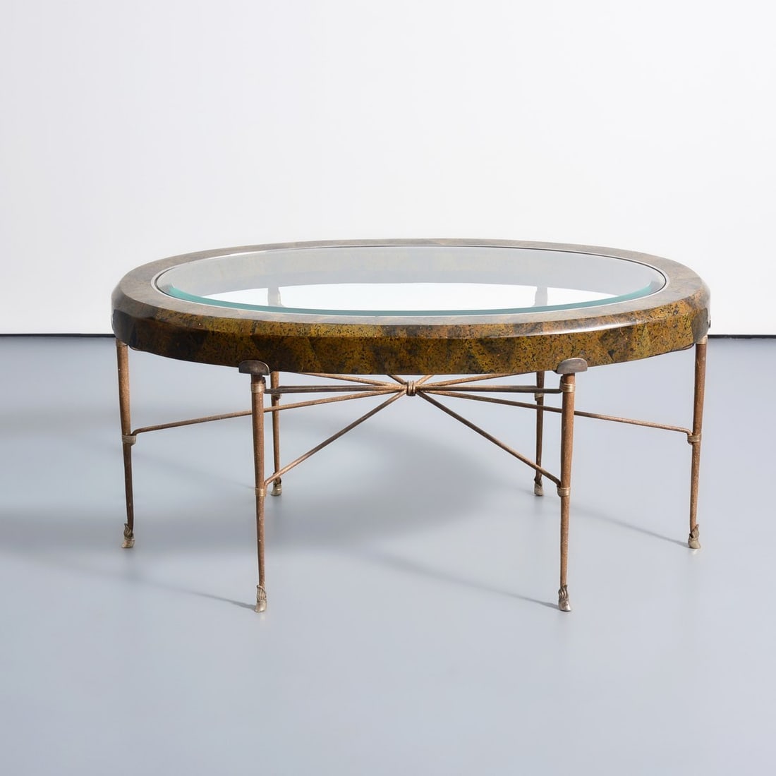 Neoclassical Coffee Table, Manner Of Maitland Smith: Artist/Designer; Manufacturer: Maitland Smith, manner of Marking(s); notes: no marking(s) apparent Materials: wrought iron, marble, glass Dimensions (H, W, D): 23.5"h, 47.5"w, 30.25"d Additional Infor