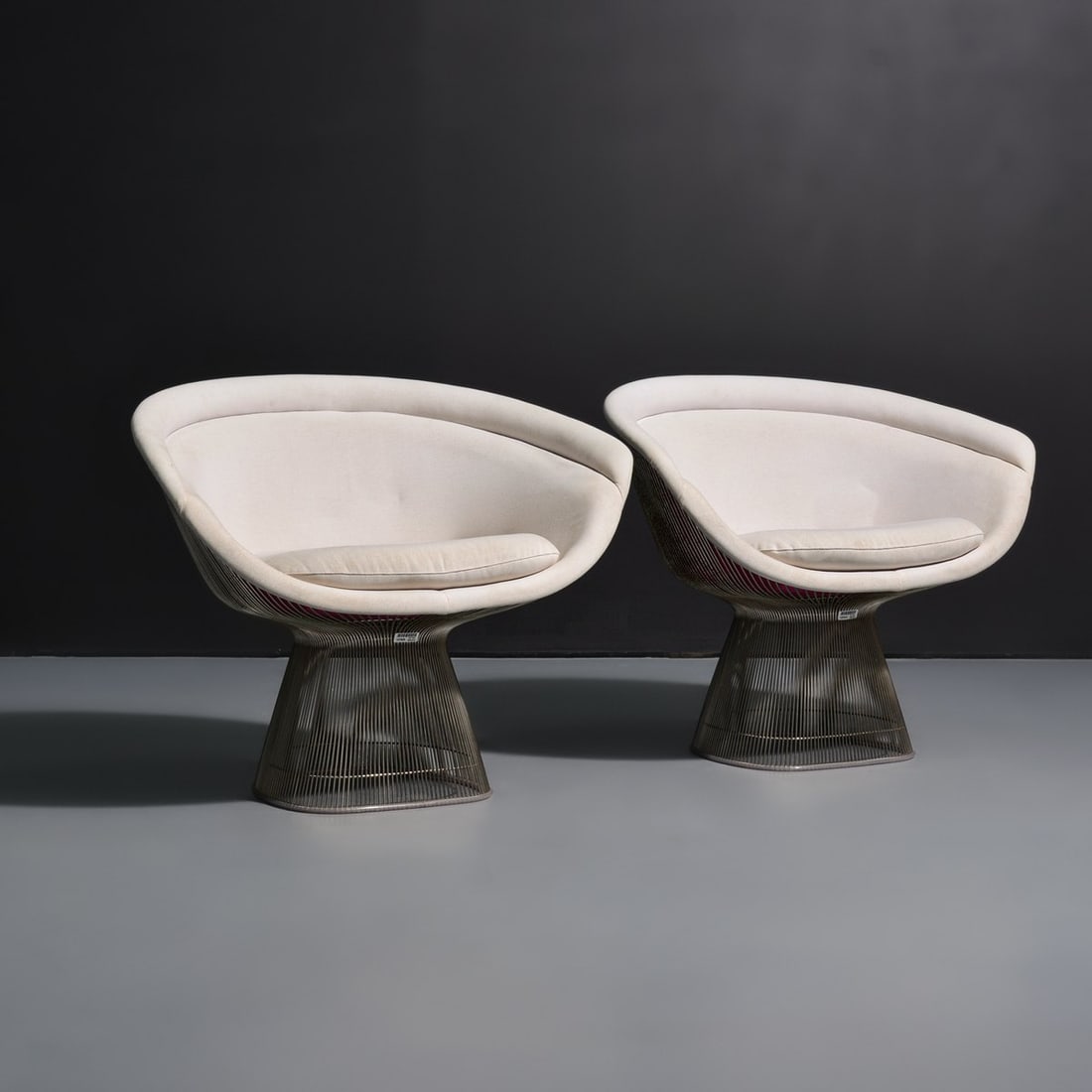 Pair of Warren Platner Lounge Chairs: Artist/Designer; Manufacturer: Warren Platner (American, 1919-2006); Knoll (USA) Marking(s); notes: no marking(s) apparent Materials: chromed metal, upholstery Dimensions (H, W, D): 30.5"h, 37.5"w, 26