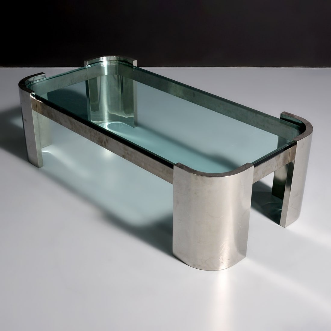 Large Ron Seff Coffee Table: Artist/Designer; Manufacturer: Ron Seff (American, 1934-1990) Marking(s); notes: no marking(s) apparent Materials: chromed metal, glass Dimensions (H, W, D): 18"h, 60"w, 29.75"d Additional Information