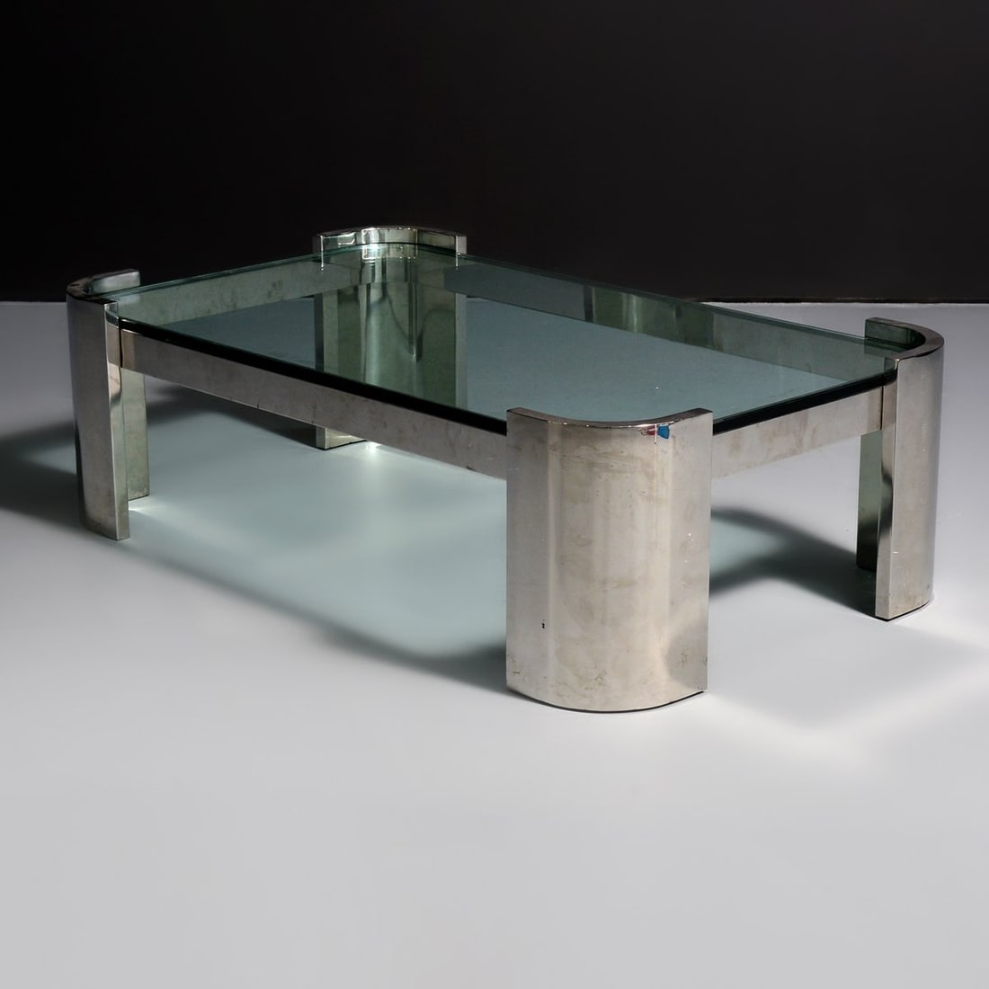Large Ron Seff Coffee Table: Artist/Designer; Manufacturer: Ron Seff (American, 1934-1990) Marking(s); notes: no marking(s) apparent Materials: chromed metal, glass Dimensions (H, W, D): 18.5"h, 59.75"w, 36"d Additional Informati