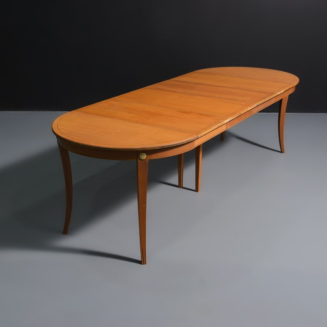 Tommi Parzinger Dining Table: Artist/Designer; Manufacturer: Tommi Parzinger (American, 1903-1981); Charak Modern (USA) Marking(s); notes: Charak label, marking(s); 1954 Materials: bleached mahogany, brass Dimensions (H, W, D): 29