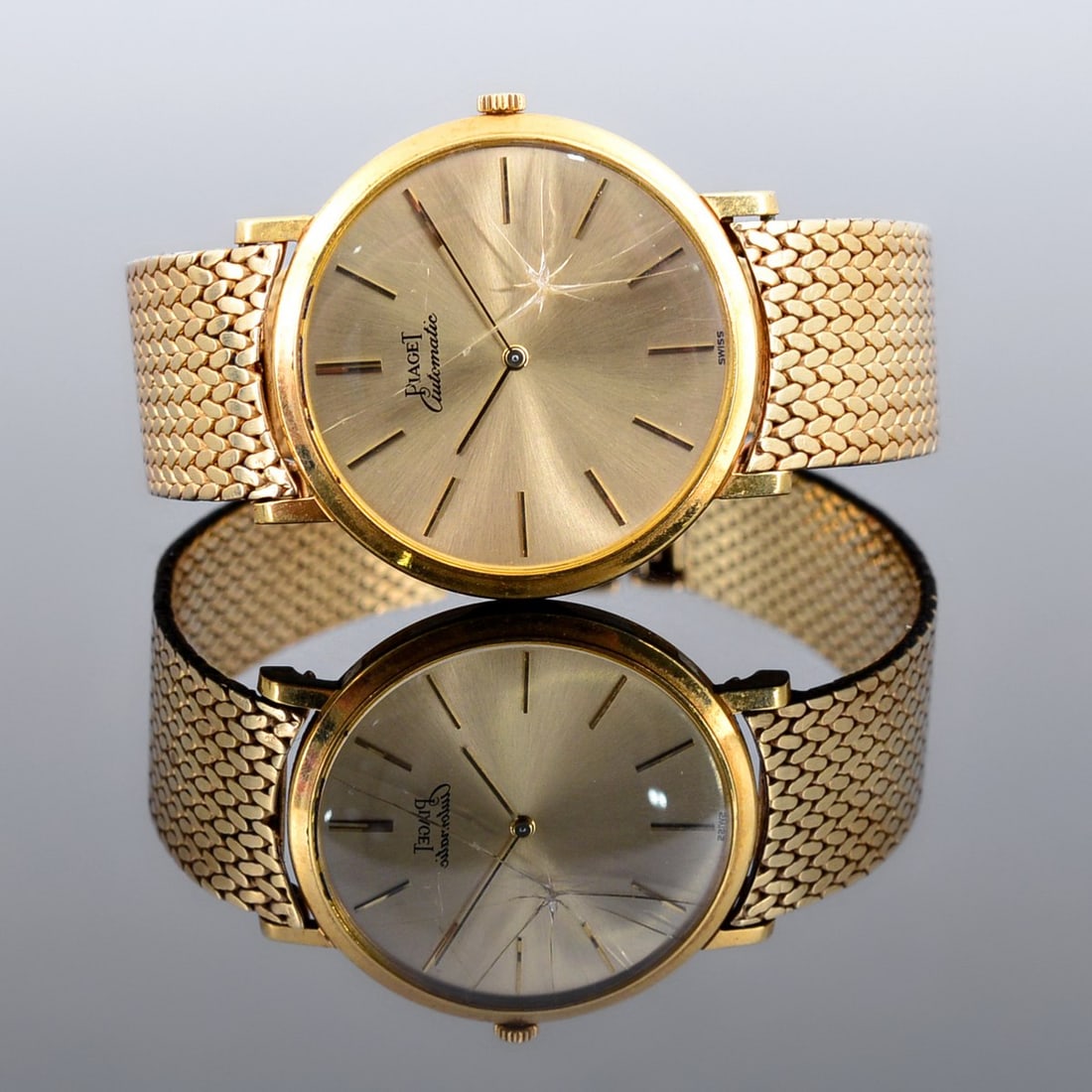 Piaget Classic 18K & 14K Gold Watch: Artist/Designer; Manufacturer: Piaget (Switzerland) Marking(s); notes: Piaget imprints, 14K, 12603 94726, hallmarks Materials: 18K gold, 14K gold, other Dimensions (H, W, D): 8.75"l, 1.25"w (Note: mea