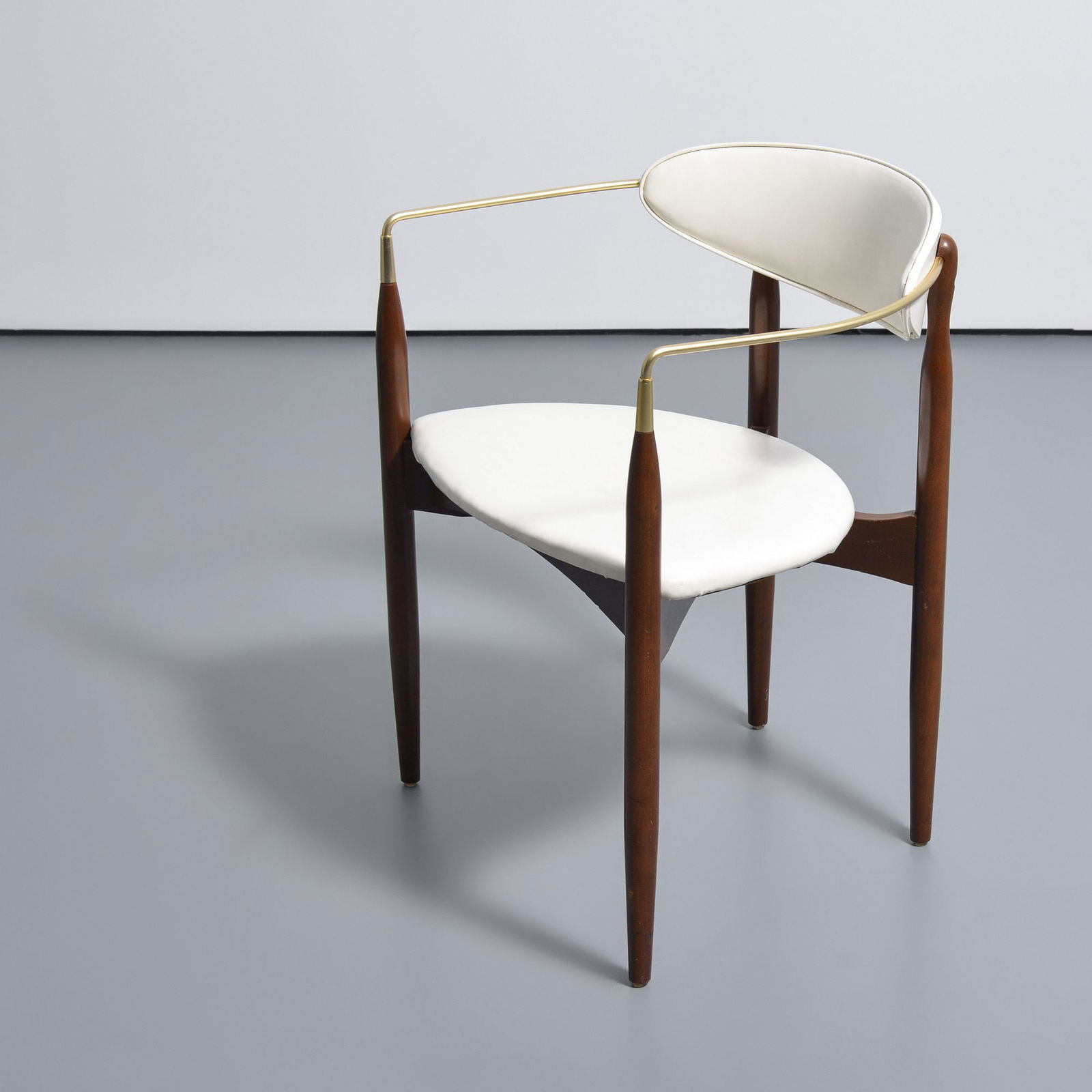 Dan Johnson VISCOUNT Armchair: Artist/Designer; Manufacturer: Dan Johnson (American, 20th Century); Selig (USA)Marking(s); notes: no marking(s) apparentMaterials: wood, brass, vinylDimensions (H,
