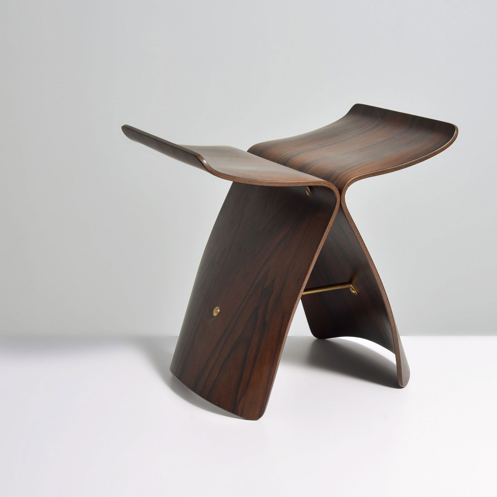 Sori Yanagi BUTTERFLY Stool: Artist/Designer; Manufacturer: Sori Yanagi (Japanese, 1915-2011); Tendo (Japan)Marking(s); notes: no marking(s) apparentMaterials: rosewood plywood, brassDimensions