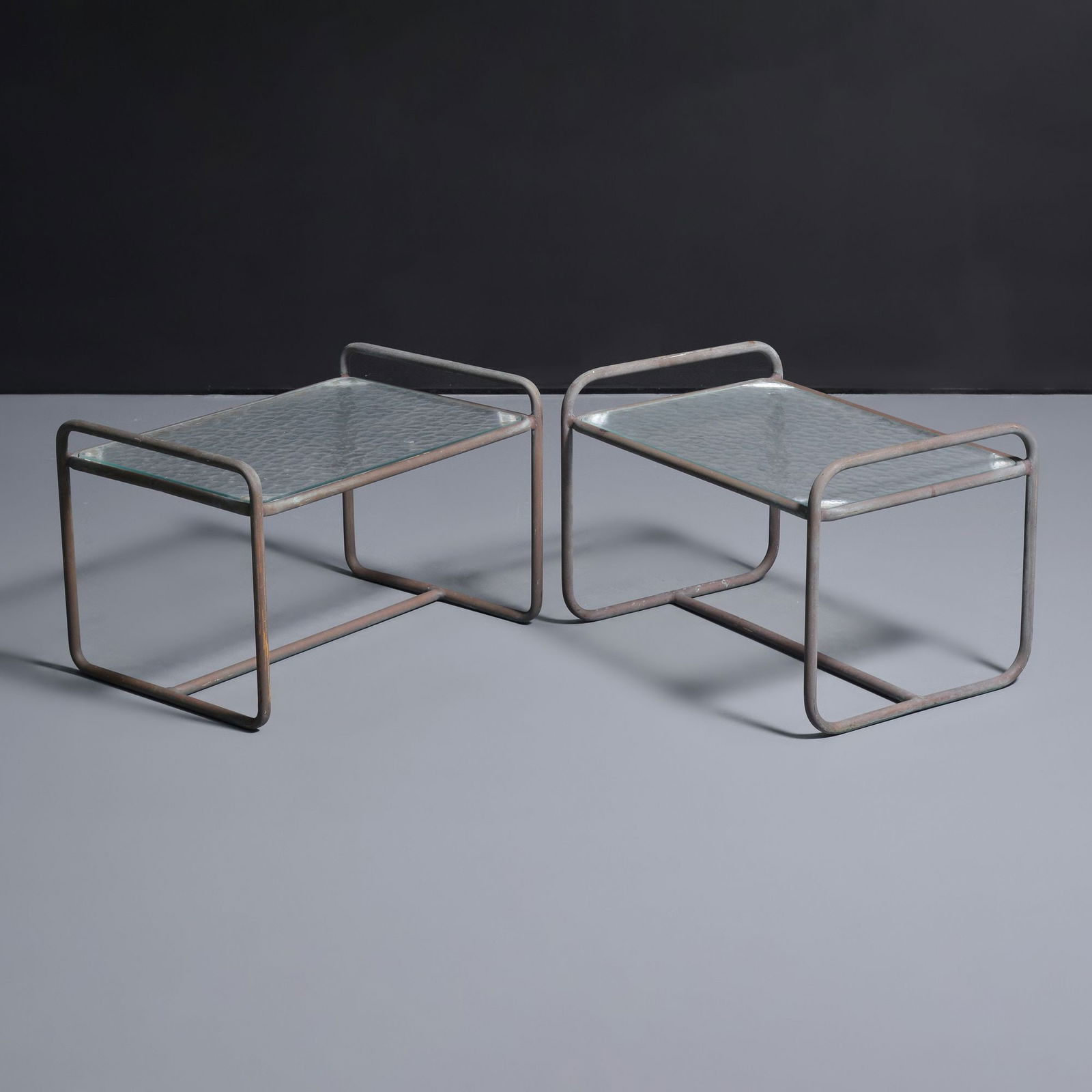 Walter Lamb Side Tables: Artist/Designer; Manufacturer: Walter Lamb (American, 1900-1989); Brown Jordan (USA)Marking(s); notes: no marking(s) apparentMaterials: bronze, glassDimens