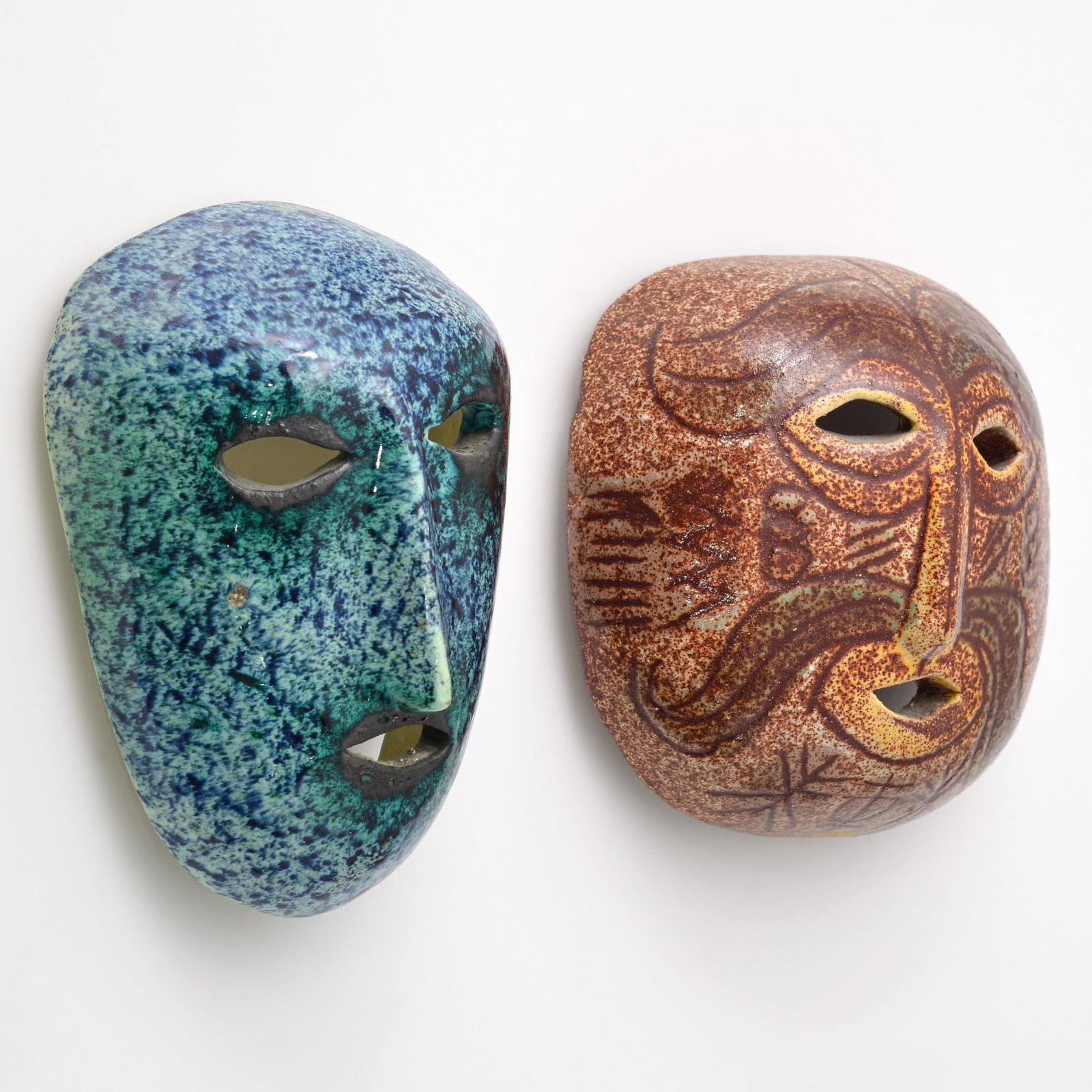 2 Slavic Paley for Accolay Pottery Masks: Artist/Designer; Manufacturer: Slavic Paley (French, 20th Century); Accolay Pottery (France)Marking(s); notes: signed, marking(s)Materials: ceramicDimensions (H, W,